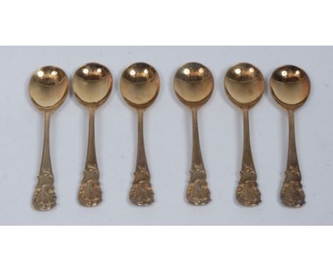 A set of six silver gilt ice cream spoons, he hafts cast with shell and acanthus scrolls, R & S Garrard & Co (James Garrard),