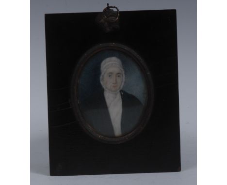 English School (early 19th century), a portrait miniature, of a lady wearing a lace bonnet, half length, watercolour on ivory