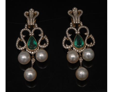 A pair of emerald, diamond and cultured pearl chandelier earrings, central teardrop emerald within an open scrolling frame en