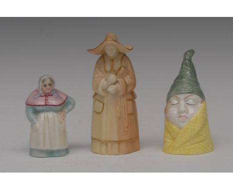 A Royal Worcester candle snuffer, French Cook, wearing a bonnet and apron, 6.5cm high, printed crown and circle mark in puce,