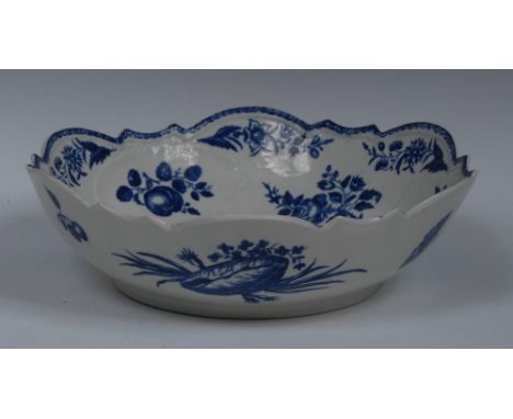 A Worcester Pine Cone pattern shaped circular junket dish, printed in underglaze blue with pine cones, peonies and pomegranat
