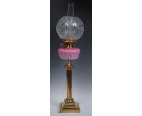 A Victorian brass oil lamp, Corinthian column,  pink satin glass reservoir, etched clear glass globular shade, Evered & Co Pa
