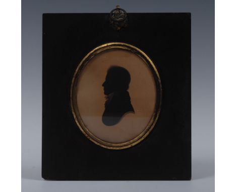 English School (early 19th century), portrait silhouette, of a gentleman, in profile, wearing stock and black frock coat, wat