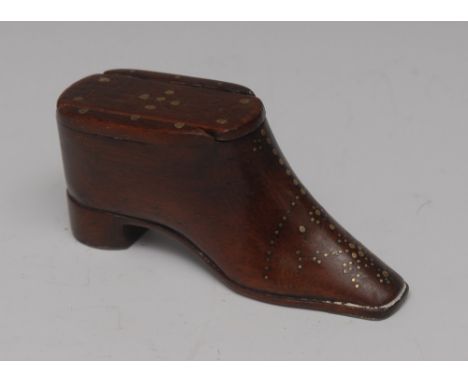 An early 19th century mahogany novelty snuff box, as a shoe, sliding cover, decorated with brass pinwork, pewter well and hee