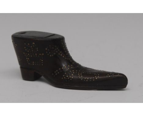 A late 18th/early 19th century novelty snuff box, as a shoe, decorated with brass pinwork, the sole with initials, sliding co