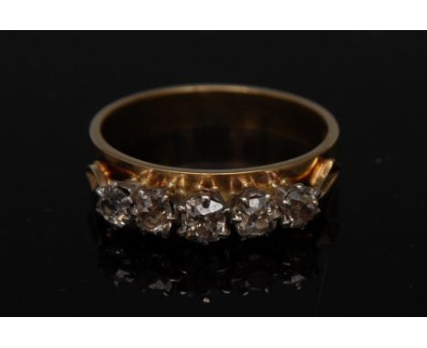 A diamond five stone ring, inset with five old mine cut diamonds ranging from approx 0.23 to 0.14ct, total estimated diamond 