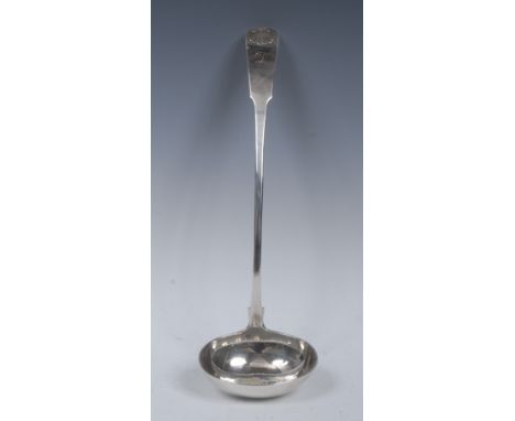 A George IV Scottish Fiddle and Shell pattern ladle, monogrammed, 35cm long, probably Franklin & Sons, Edinburgh 1824, 6oz