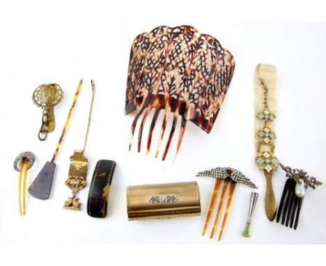A group of items to include a horn and cut steel crescent comb, another with paste set wings, imitation tortoiseshell mantill