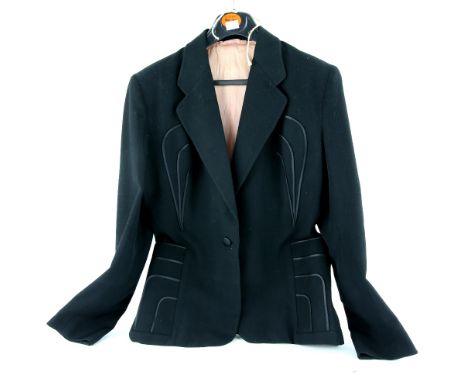 1940s black ladies suit jacket with applied detail to pockets and label areas, a white cotton blouse with embroidered floral 