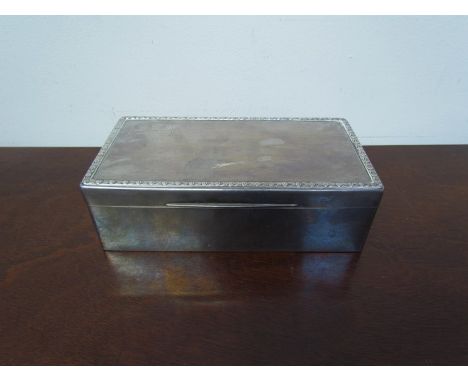 A James Dixon and Sons silver cigarette box with engine turned detail dated and monogram to corner, Birmingham 1933, 18cm lon