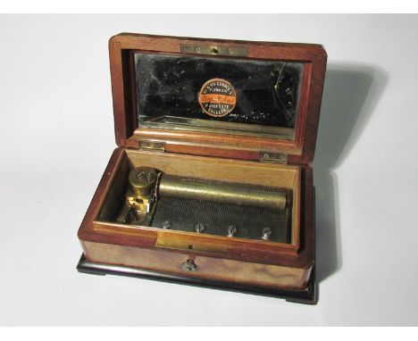 A late 19th Century Moon and Sons of Plymouth miniature cylinder music box playing three airs, burr walnut crossbanded case w
