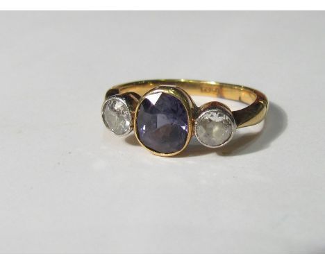 A sapphire and diamond three stone ring, the gems collet set on an 18ct gold shank 