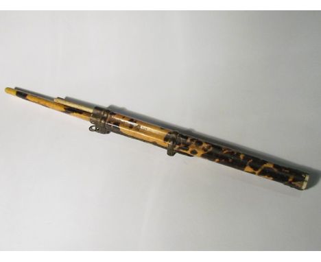 A Japanese knife and chopstick set within a tortoiseshell case