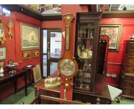 A mid Victorian barometer with silvered dial thermometer and gilded lions 