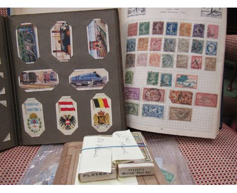 Cigarette cards and stock stamp album, some loose 