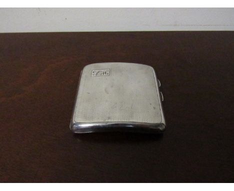An E.J. Trevitt & Sons silver cigarette case with engine turning and monogram, Chester 1932, 90g