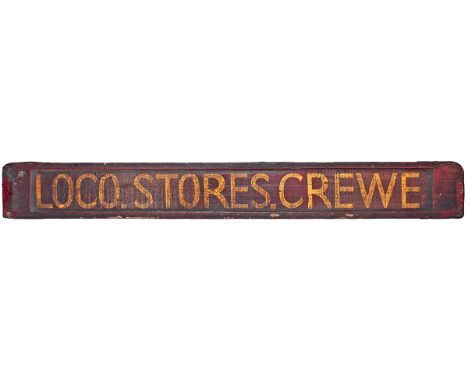 Carriage board LOCO STORES CREWE measures 28in x 3.5in. Straw on maroon paint complete with original metal ends. An unusual i