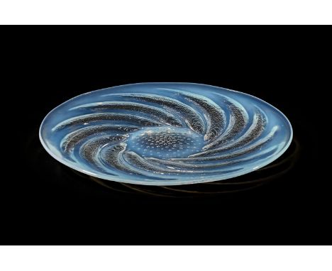RENÉ LALIQUE (FRENCH, 1860-1945) 'POISSONS' PLATE; DESIGNED 1931; PRE 1945 Opalescent glass 32cm diameter Signed 'R.Lalique' 