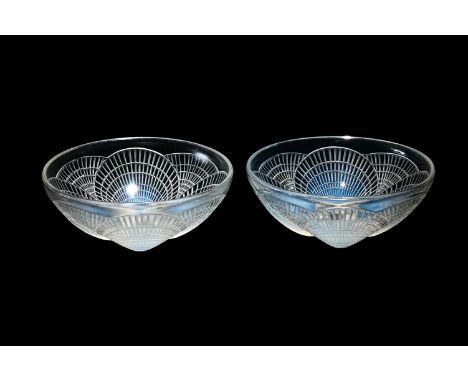 RENÉ LALIQUE (FRENCH, 1860-1945) TWO 'COQUILLES' BOWLS; DESIGNED 1924; PRE 1945 Opalescent glass All 18.5cm diameter Signed '