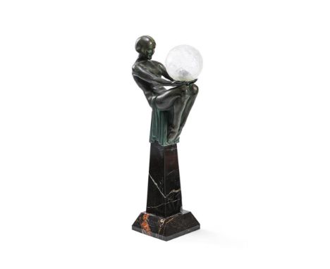 MAX LE VERRIER (FRENCH) ART DECO FIGURAL LAMP; 20TH CENTURY Verdigris patinated art metal, on veined marble pillar base, with