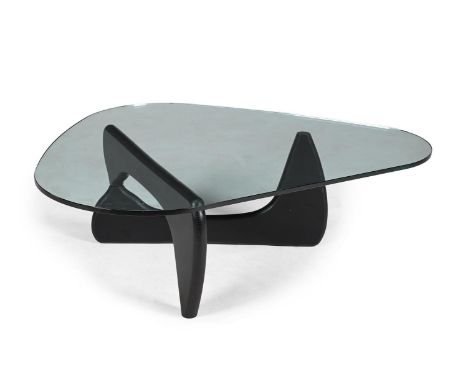 IN THE MANNER OF ISAMU NOGUCHI LOW COFFEE TABLE; LATE 20TH CENTURY Ebonised wood, glass 39.5cm high, 127cm wide (approx), 93.