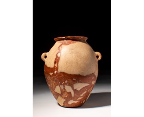 Late Naqada II to Early Naqada III, Ca. 3500 - 3200 BC.A charming breccia jar with an ovoid body that tapers in towards the n