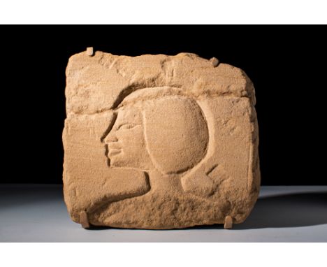 New Kingdom, Amarna Period, Reign of Akhenaton, Ca. 1352 - 1336 BC.A sculpted relief, depicting the head and shoulders of a r