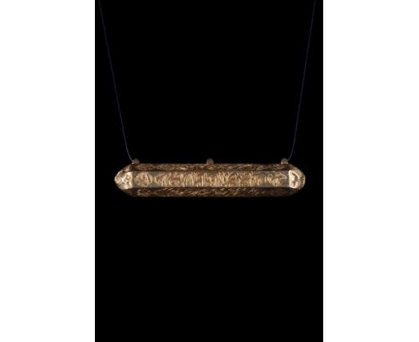 Ca. 18th century AD.A gold scroll holder amulet of hexagonal cylindrical form with each end shaped as a cap. It is decorated 