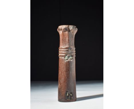 New Kingdom, 18th Dynasty, Ca. 1550 - 1295 BC.A slender cylindrical kohl tube carved from a single piece of ebony and taking 
