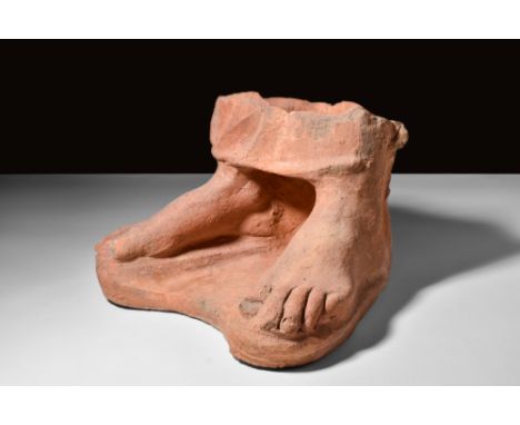 Ca. 3rd-2nd century BC.A near life-size, naturalistically modelled pair of feet with an integral base and a lower section of 