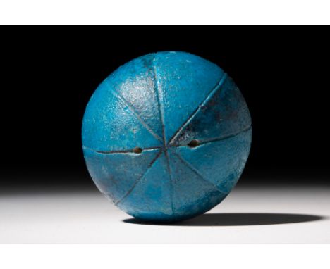 Middle Kingdom, 18th Dynasty, Ca. 1550 - 1295 BC.Bichrome glazed faience composition spherical bead of alternating turquoise 