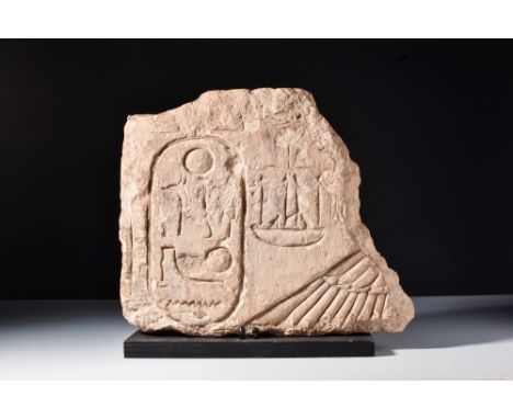 Ca. 1279 - 1213 BC. A large limestone fragment of an inscribed hieroglyphic panel. The cartouche contains the prenomen of Kin