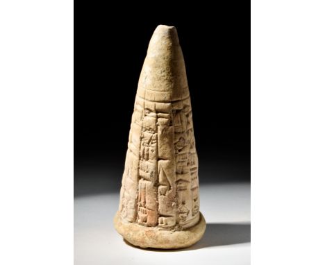 Ca. 2000 BC .An Old Babylonian foundation cone ‘clay nail’ with cuneiform roughly two-thirds around the body. The Sumerian de
