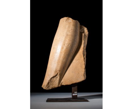 Middle Kingdom, 12th Dynasty, Ca. 1859 - 1813 BC.A fragment of a large calcite statue comprising of the lower leg and feet of