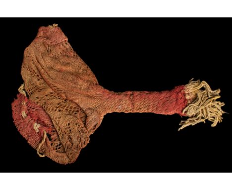 Coptic Period, Ca. AD 395-642.A rare Egyptian Coptic textile cap in blue, red and yelow wool. Plaited using a (Sprang) techni