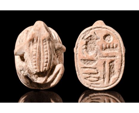 New Kingdom, 18th Dynasty, Ca. 1481 - 1425 BC . A steatite amulet seal in the form of a frog (Heket), the underneath is flat 