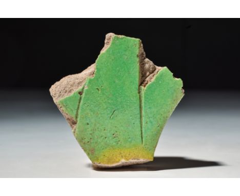 New Kingdom, 18th Dynasty, Ca. 1550 - 1295 BC .A green and yellow faience inlay in the form of a blue lotus or lily flower (N