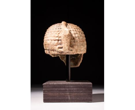New Kingdom, Ramesside Period, Ca 1292 - 1069 BC . A crown of blue faience for a royal statue with short echeloned curls, ori