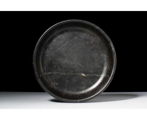 New Kingdom, Ca. 1550 - 1070 BC.A bowl with a globular thick-walled shouldered body, tapering to a flat ring base, with a sho