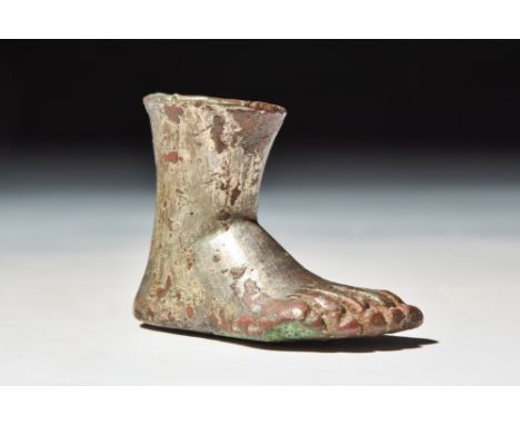 Ca. AD 200 - 300 .A hollow-cast foot, with silver gilding, originally from a small statue or a votive offering, made with toe