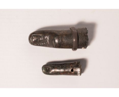 Ca. AD 100 - 300 .A pair of bronze life-sized fingers, which would have once been part of a large statue or votive hand. The 