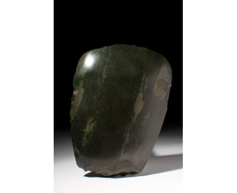 Ca. 4000 - 3000 BC.A well polished stone axe head. For a similar example, see the Metropolitan Museum of Art, Accession Numbe