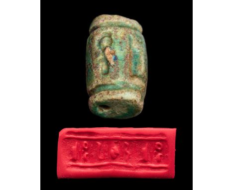 Late Dynastic Period, Ca. 664-332 BC.A cylinder seal made from attractive, hard blue faience. The seal is engraved with a lar