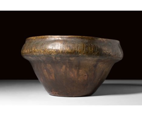 Ca. AD 224-651.A bronze vessel, characterised by its large and deep form with a truncated cone shape and a rounded flange ado