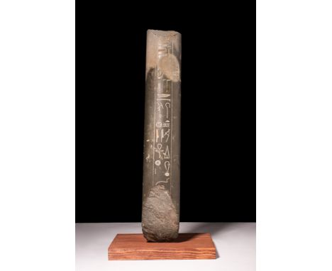 New Kingdom, 19th Dynasty, Ca. 1323 - 1279 BC . A schist fragment from a large statue of Pharaoh Seti I with incised hieroglp