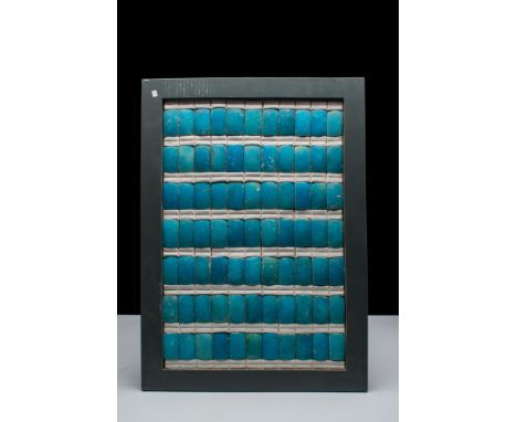 Old Kingdom, 3rd Dynasty, Ca. 2630 - 2611 BC .A group of seventy-seven blue glazed composition tiles, each a plaque with rema