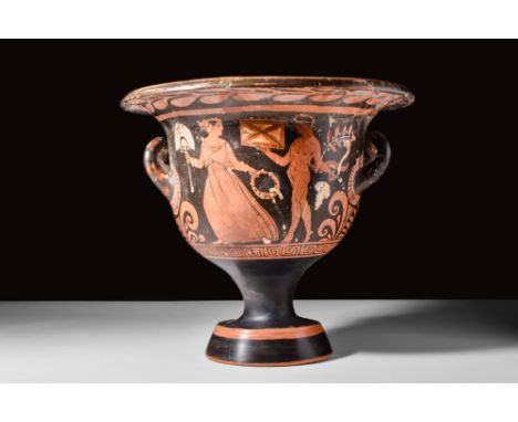 Ca. 350-320 BC.A red-figure terracotta krater with a broad rim, a bell-shaped body flanked by two lug handles, and a pedestal