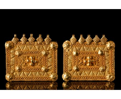 Ca. 2nd half of the 3rd century BC.A pair of gold filigree pendants, each composed of a rectangular-shaped plaque, adorned wi