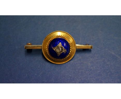 An unmarked blue enamel and diamond bar brooch, (a.f.).