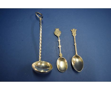 A Victorian silver sauce ladle, by Reid & Sons, Newcastle 1864, having twisted stem, 16cm, 39g; together with a silver Diana 